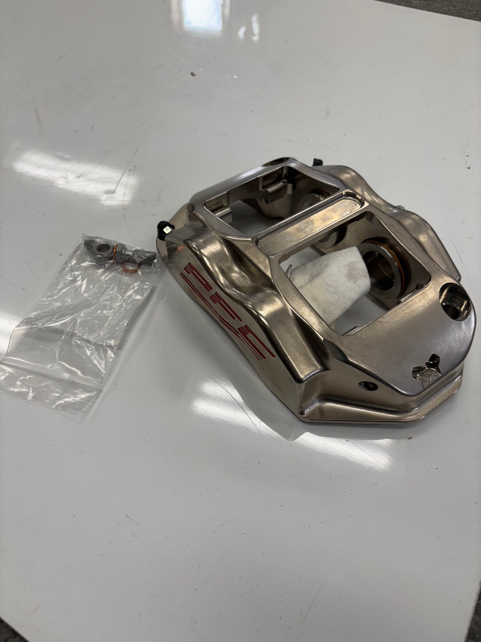 USED (NEW) PFC BRAKES ZR94 BRAKE CALIPER (MISSING PISTON)